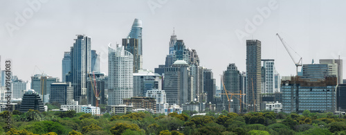 Bangkok town in THAILAND  in Midday with a clear sky and some building it is not complete on May.  many construction in town.