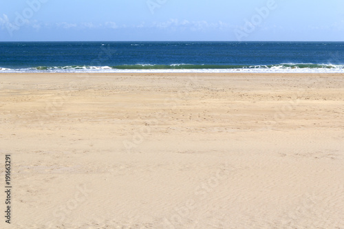 Semi abstract sand sea and sky horizon of the beach at Broad Haven South near Bosherston, Pembrokeshire, Wales, UK photo