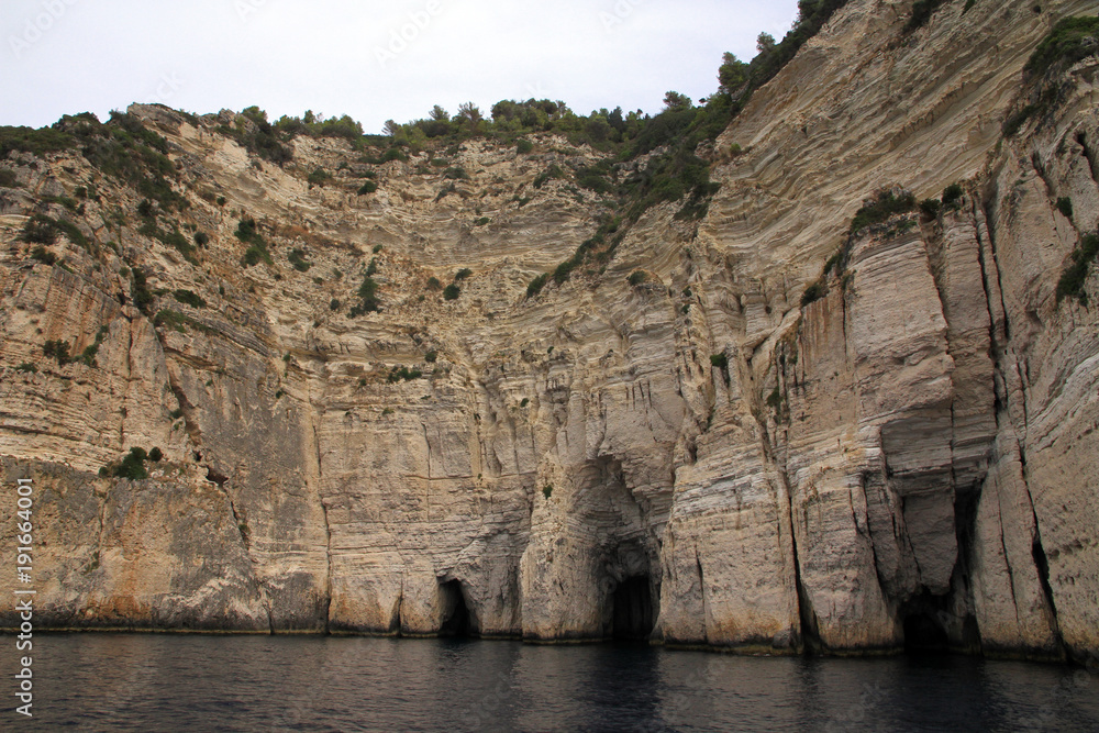 Cliffs and sea caves, Paxos Island, Greece