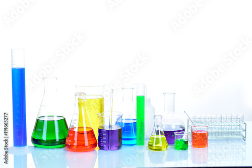 Laboratory glassware with colorful chemical reagent in research laboratory 