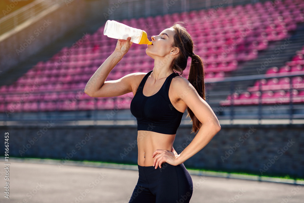 Premium Photo  Happy and healthy teen girl. fit child drink water after  training. sport jumping rope equioment. athletic kid care of water balance  in body. hydration. feel thirsty. protein and vitamin