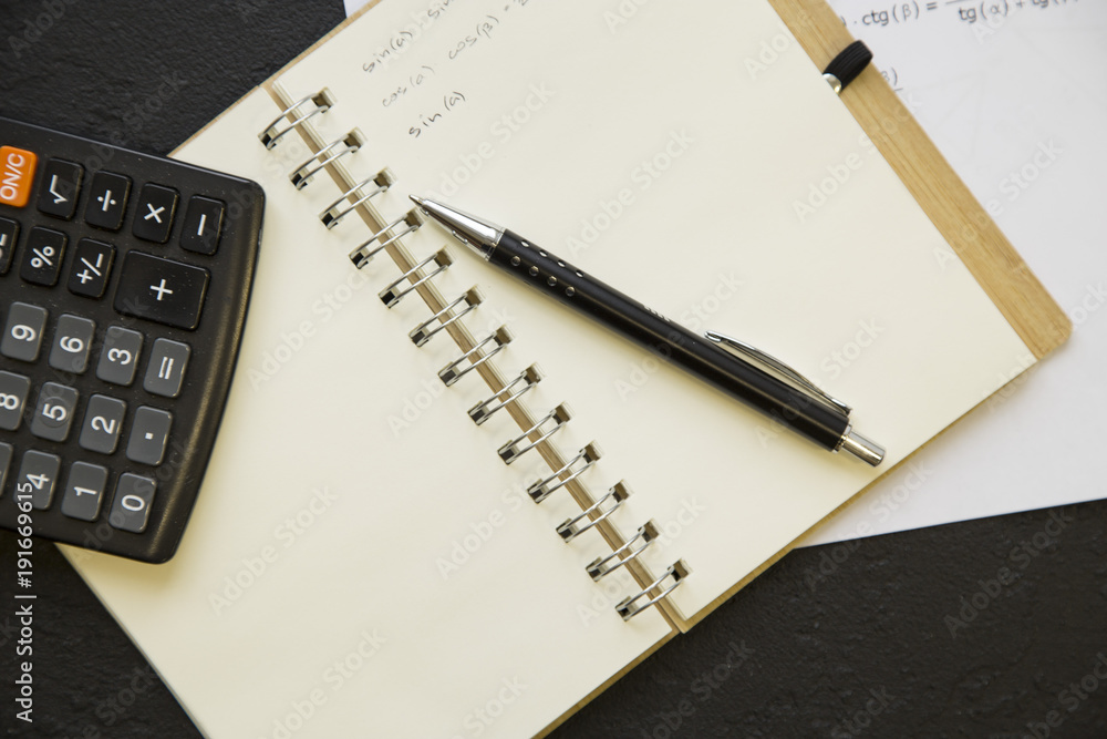 Math concept on a balck stone background Math concept on a balck stone background