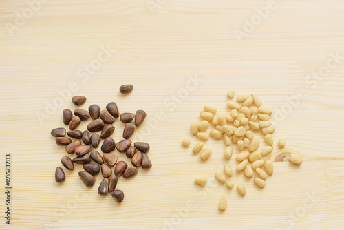 peeled pine nuts, and unshelled pine nuts