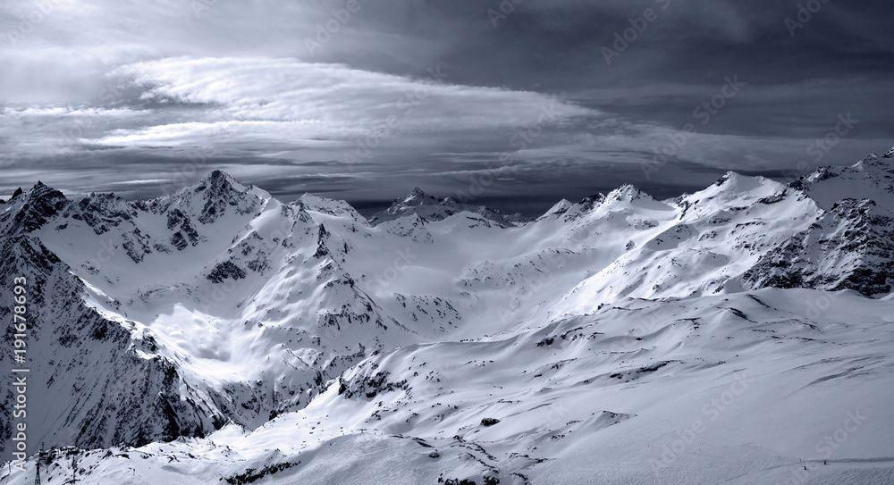 panoramic snow mountains white sky