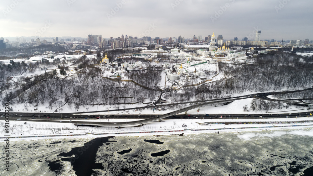aerial view to the Kiev-Pechersk Lavra and motherland monument in winter