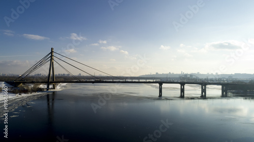 Landscape with suspension Moscow Bridge across the Dnieper river, Obolon, Kiev, Ukraine