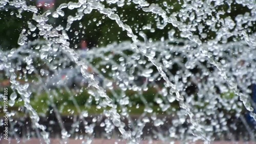 summer fountain in the center of city photo