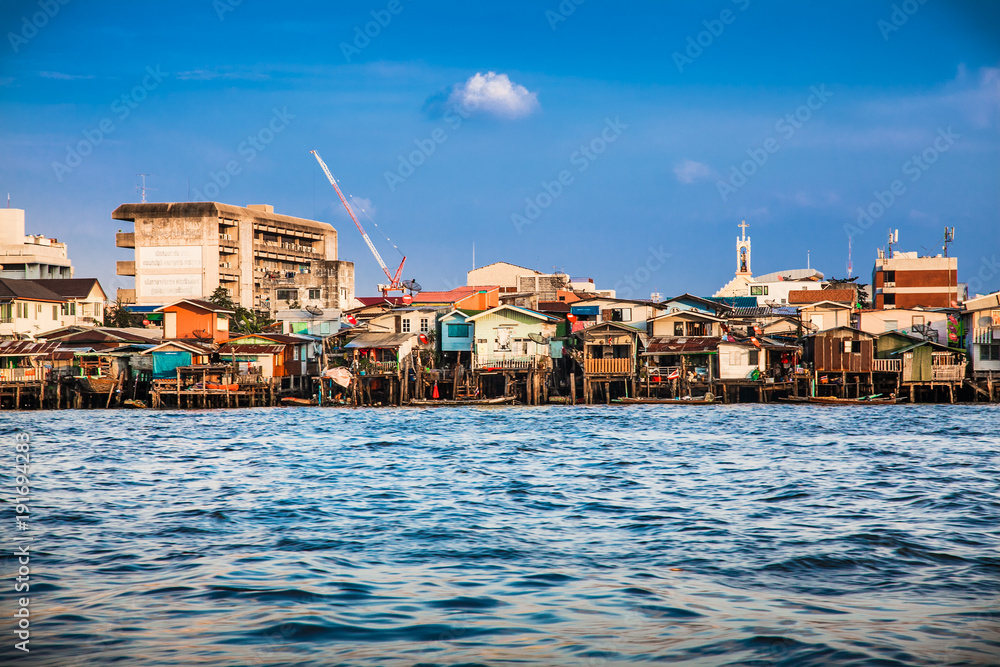 Fototapeta premium Old Thai traditional houses at Chao Phraya River in Bangkok Thailand.