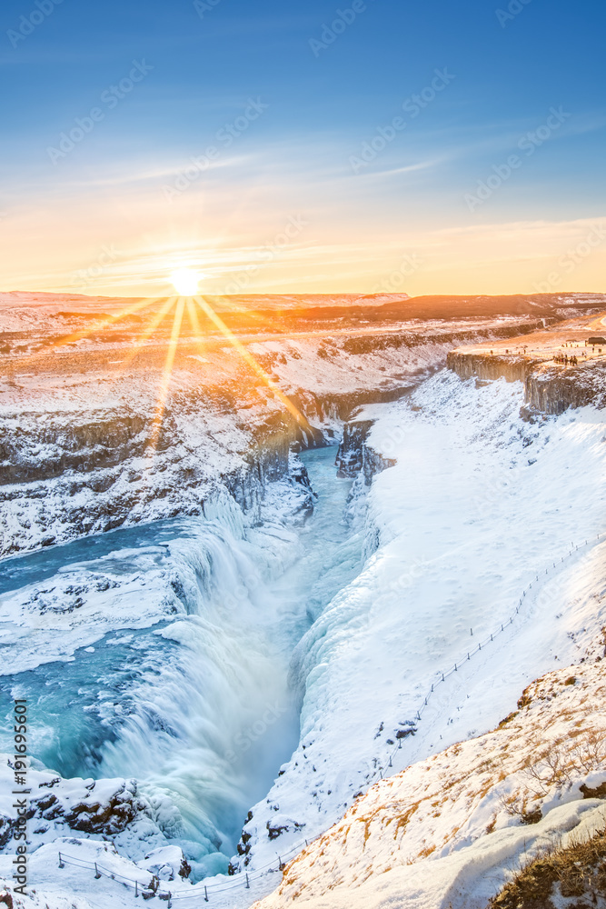 Obraz premium Winter sunrise above Gullfoss waterfall, in Iceland. Gullfoss is one of the most popular tourist attractions in Iceland.