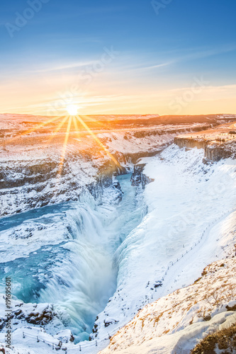 Winter sunrise above Gullfoss waterfall, in Iceland. Gullfoss is one of the most popular tourist attractions in Iceland.