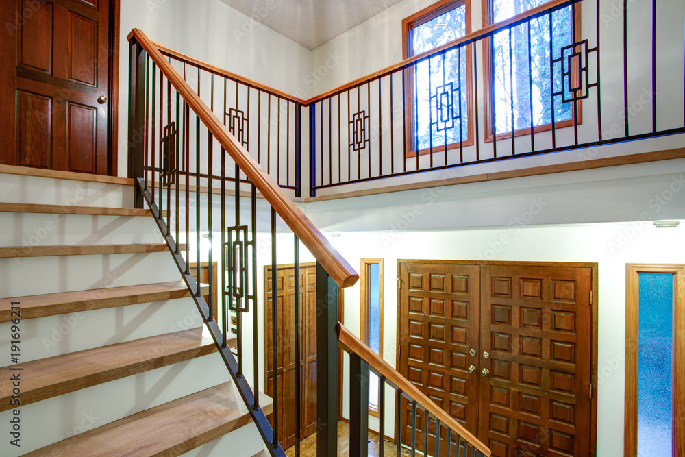 Luxury home interior with view of the entrance hallway Luxury home interior with view of the entrance hallway