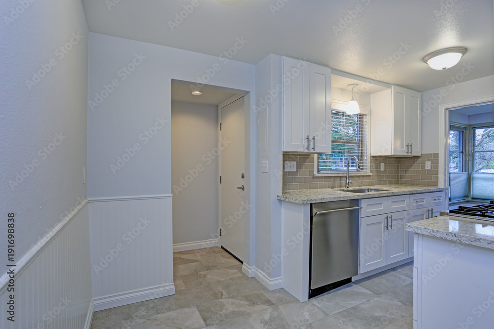 Photo of a small compact kitchen with white shaker cabinets Photo of a small compact kitchen with white shaker cabinets