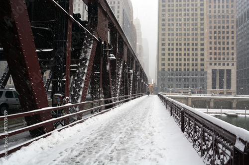 The Wells St. bridge over the Chicago River during a snow storm.