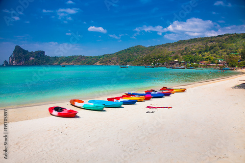 Colorful kayaks at Ao Loh Dalum beach on Phi Phi Don Island, Thailand.