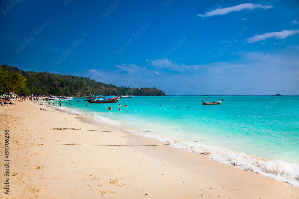 Longtail boats at Carpe Diem Beach on Phi Phi Islands, Thailand. Longtail boats at Carpe Diem Beach on Phi Phi Islands, Thailand.