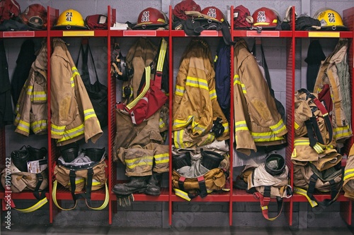 Fototapeta Firefighter gear helmet on a truck