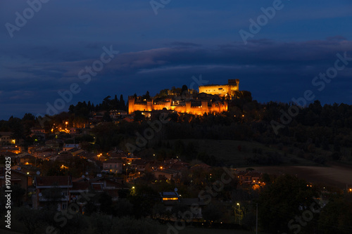 Night view of the medieval Gradara castle near Pesaro city, Marche, Italy.