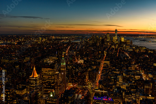 New York City - Manhattan downtown skyline skyscrapers at night - View from Observation Deck on the Empire State Building at twilight. USA. © Simon Dannhauer