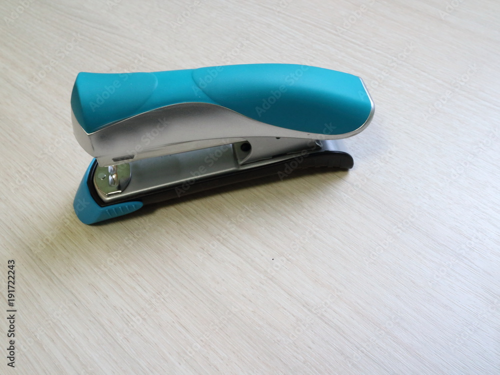 color office stapler on the table color office stapler on the table