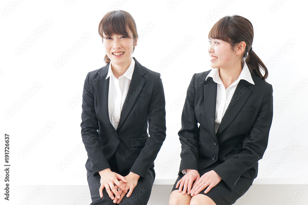 Businesswomen working at office Businesswomen working at office