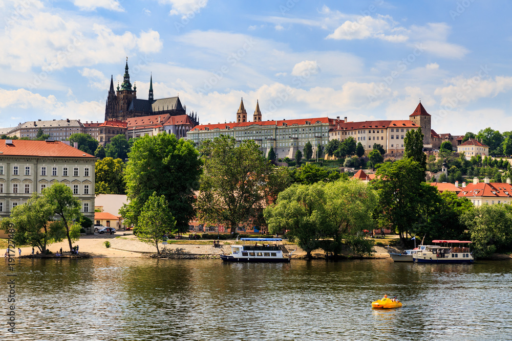 View of Vltava River and Castle of Prague on a sunny day