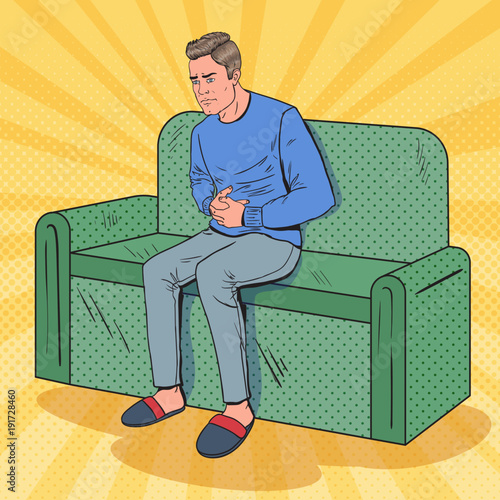 Pop Art Unhappy Man Suffering from Stomach Ache. Sick Guy Sitting on Couch at Home. Vector illustration