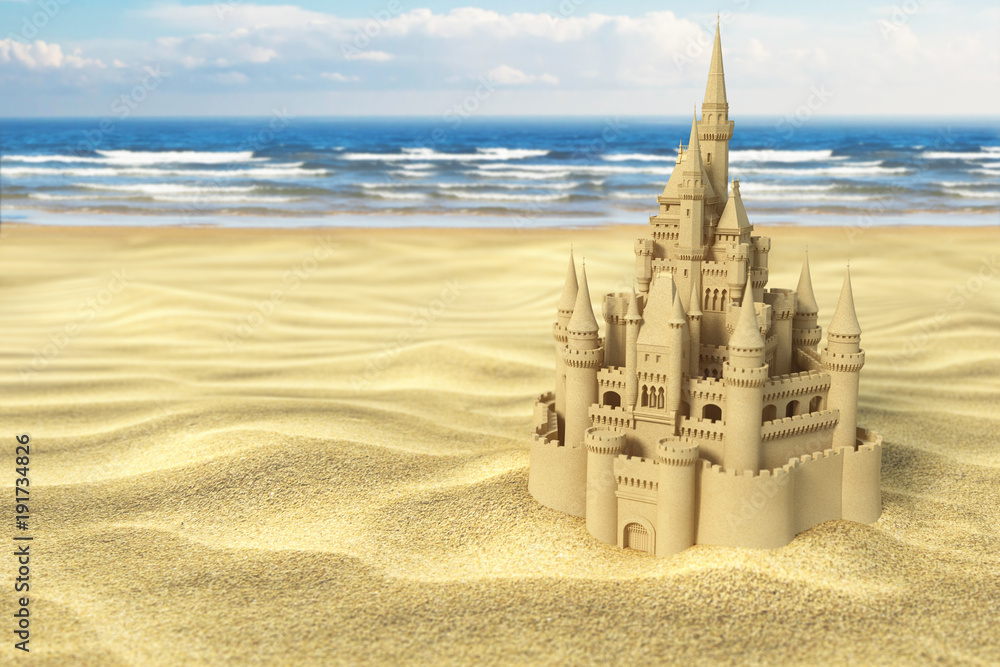 Sand castle on the beach on the sea and sky background. Stock ...