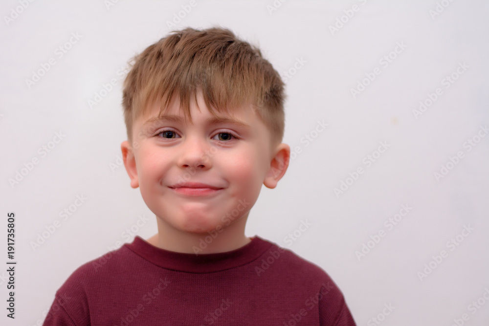Portrait of a very positive boy on an isolated background Portrait of a very positive boy on an isolated background