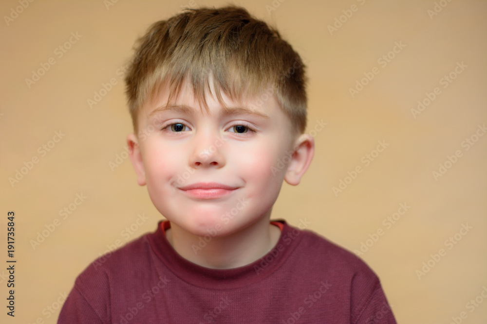 Portrait of a very positive boy on an isolated background Portrait of a very positive boy on an isolated background