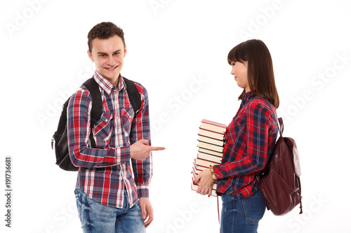 Unhappy teenager with many books