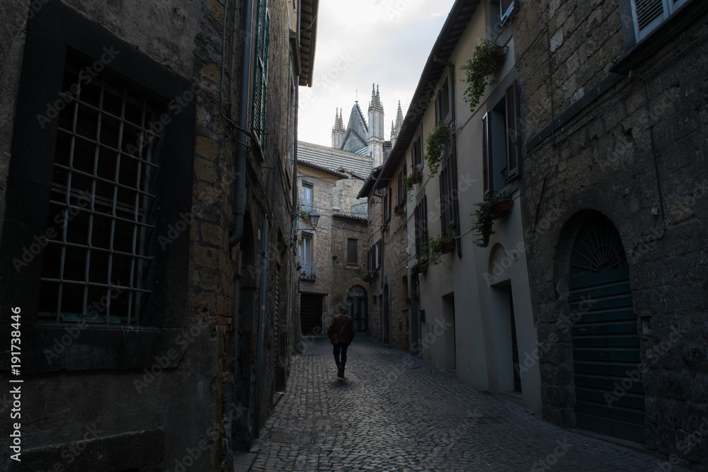 Through the dark, narrow streets of Orvieto Old Town in Umbria, Italy