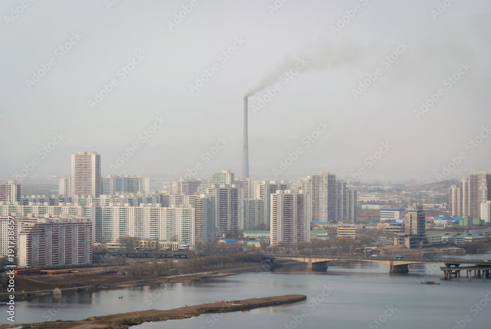 Pyongyang skyline smog on a cold spring morning