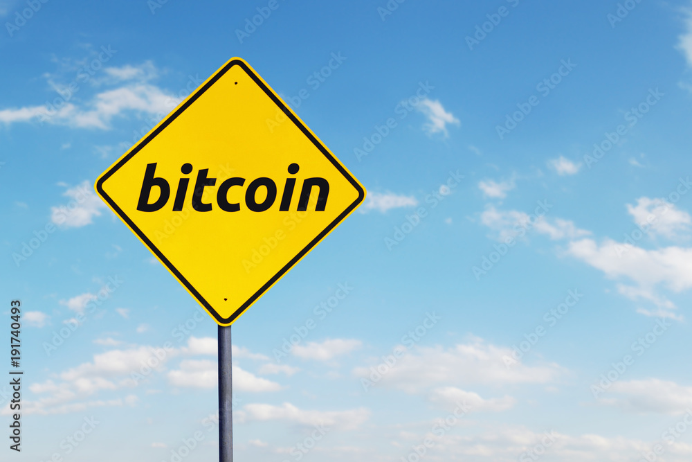 Bitcoin word on the yellow signboard Bitcoin word on the yellow signboard