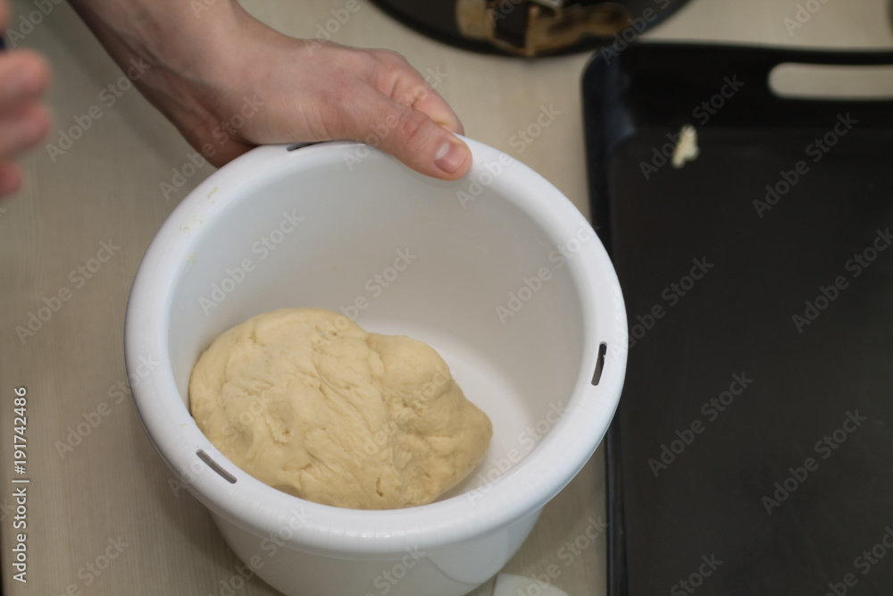 Man kneading dough Man kneading dough