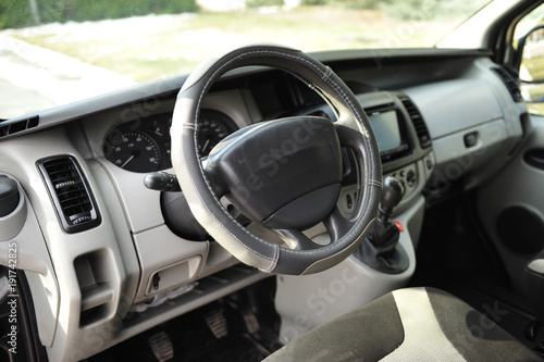 interior of a modern car with steering wheel © ruslan_shramko
