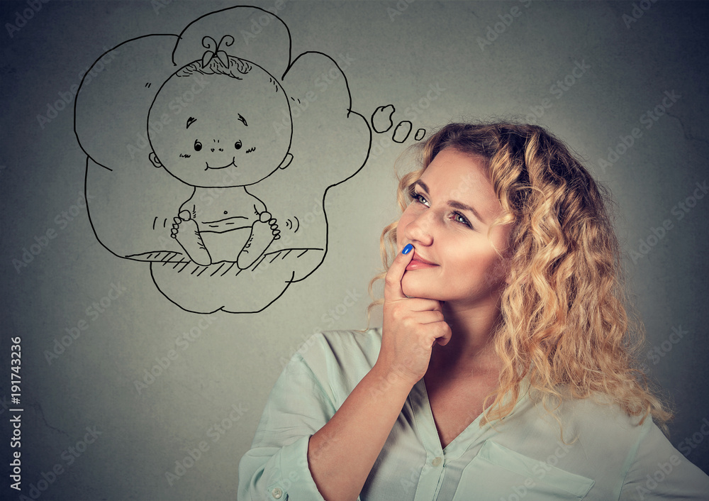 Young woman dreaming of baby Young woman dreaming of baby