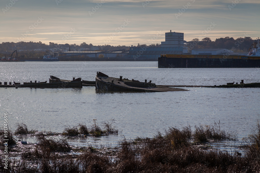 a view of river Thames during the sunset on a sunny day in industrial part of Thames estuary near Rainham naturre reserve a view of river Thames during the sunset on a sunny day in industrial part of Thames estuary near Rainham naturre reserve