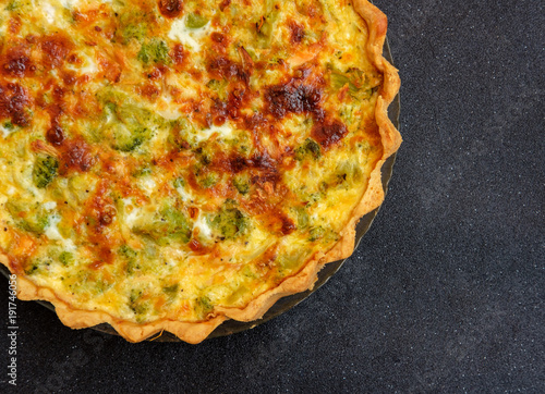 French quiche with salmon and broccoli