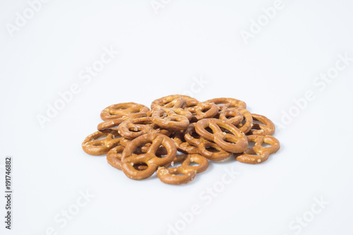 Salty snack brezel composition in a white background photo