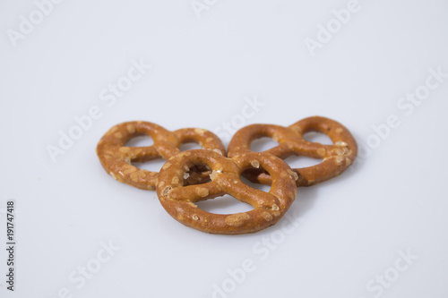 Salty snack brezel in a white background
