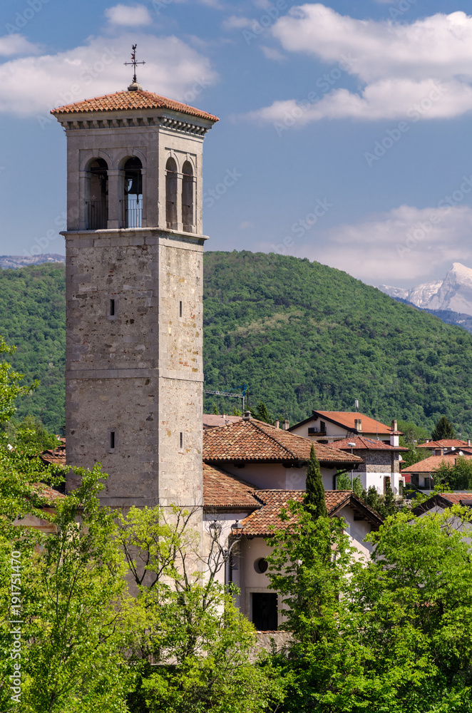 view of an old bell tower in Cividale del friuli during summer, Italy.