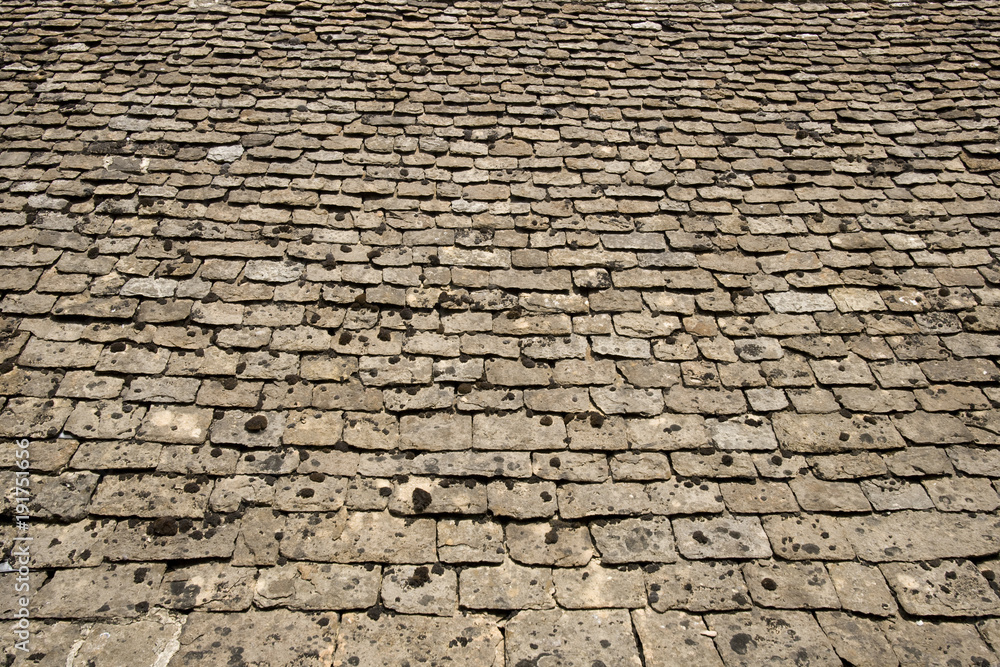 Old limestone roof tiles background