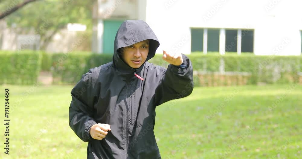 asian man exercise in green park asian man exercise in green park