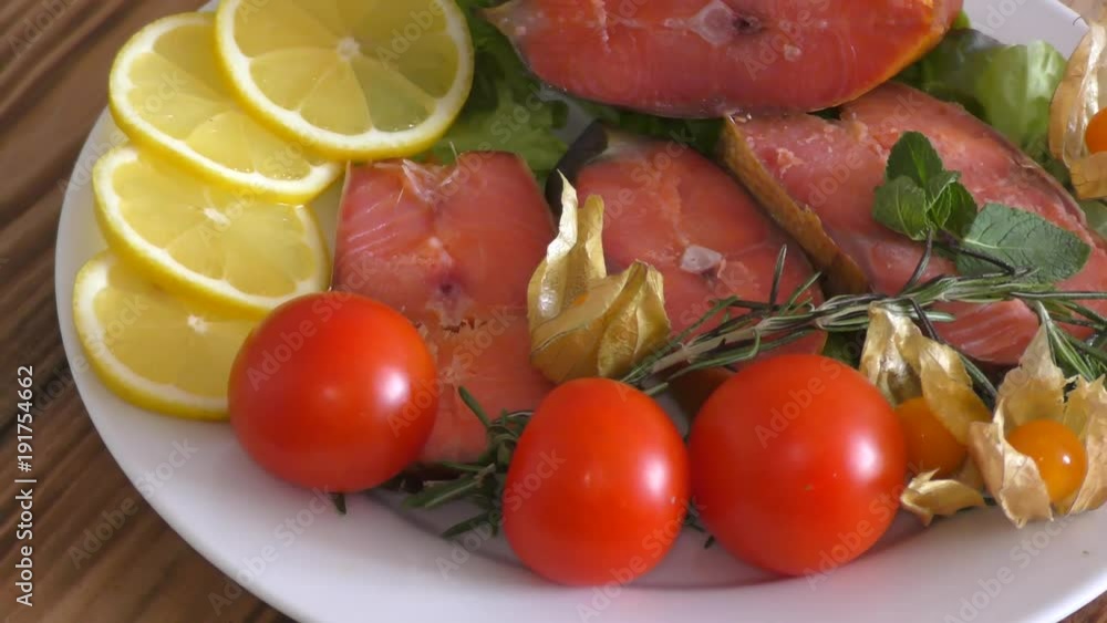Chinook salmon (LAT. Oncorhynchus tshawytscha) smoked with fresh Greens and vegetables Chinook salmon (LAT. Oncorhynchus tshawytscha) smoked with fresh Greens and vegetables