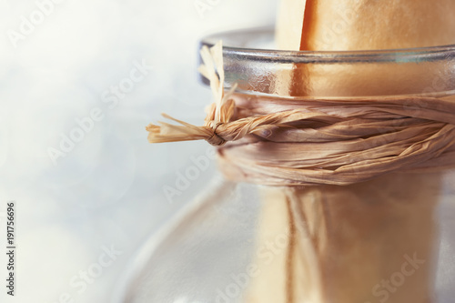 Message inside a glass bottle close up