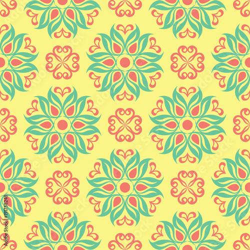 Seamless pattern with floral design. Bright yellow background with pink and green flower elements
