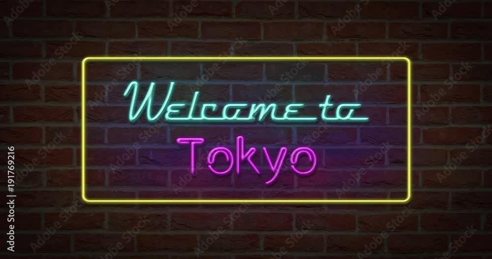 Neon text sign of Welcome to Tokyo in brick background Neon text sign of Welcome to Tokyo in brick background