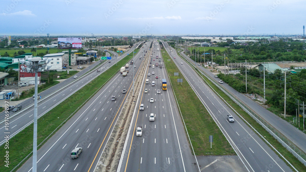 Aerial view of the highway with traffic.