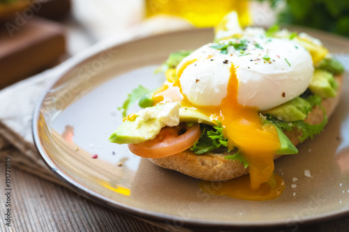 Sandwich with avocado and poached egg