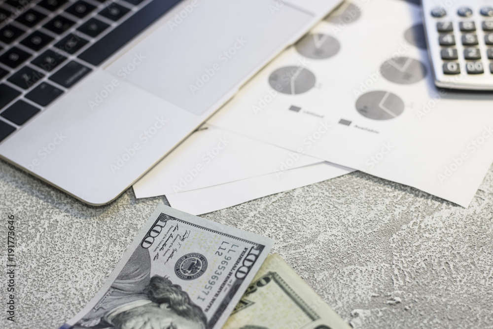 Coins and paper United States money near a keabord of a laptop. Euro coins.  USA money. Euro currency. Money concept. Closeup Stock Photo | Adobe Stock